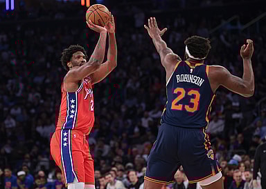 Philadelphia 76ers center Joel Embiid (21) shoots the ball as New York Knicks center Mitchell Robinson (23) defends during the first half during game two of the first round for the 2024 NBA playoffs at Madison Square Garden