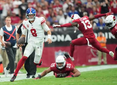 Sep 17, 2023; Glendale, Arizona, USA; New York Giants quarterback Daniel Jones (8) runs against the Arizona Cardinals during the second half at State Farm Stadium. Mandatory Credit: Joe Camporeale-USA TODAY Sports