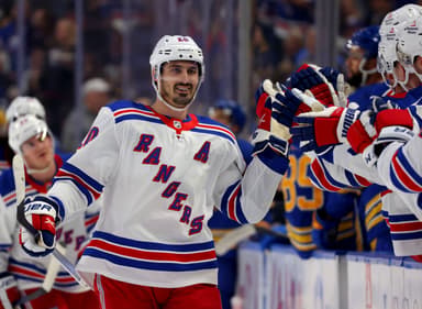 New York Rangers left wing Chris Kreider (20) celebrates his goal with teammates during the first period against the Buffalo Sabres at KeyBank Center