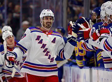New York Rangers left wing Chris Kreider (20) celebrates his goal with teammates during the first period against the Buffalo Sabres at KeyBank Center