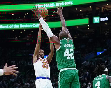 Oct 22, 2024; Boston, Massachusetts, USA; New York Knicks forward Mikal Bridges (25) shoots against Boston Celtics center Al Horford (42) in the second half at TD Garden. Mandatory Credit: David Butler II-Imagn Images