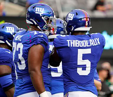 kayvon thibodeaux, new york giants, evan neal