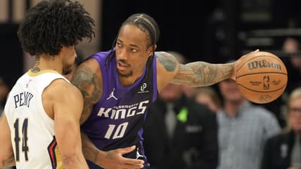 DeMar DeRozan dribbles for the Kings as a Knicks buyout idea