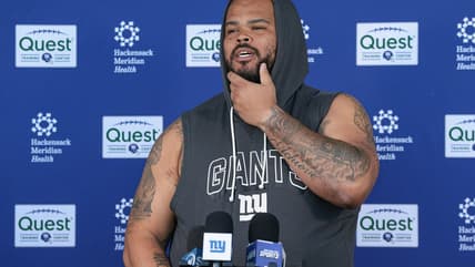 Jermaine Eluemunor speaking with media after Giants OTA