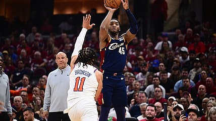 Donovan Mitchell shoots over Jalen Brunson during a Knicks playoff game