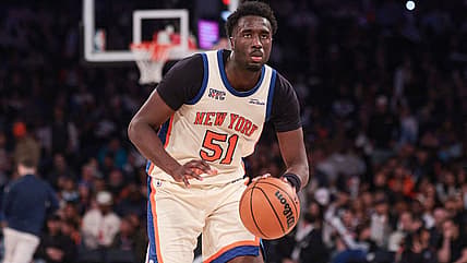 Mohamed Diawara dribbling for the Knicks at Madison Square Garden