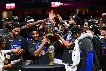 Knicks players celebrating after winning the Eastern Conference Finals