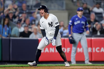 Anthony Volpe reacts after scoring for the Yankees against Toronto