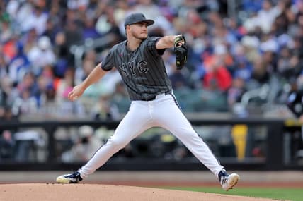 Christian Scott pitches for the Mets against the Marlins