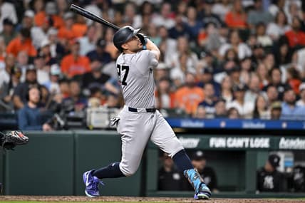 Giancarlo Stanton swings for the Yankees against Houston