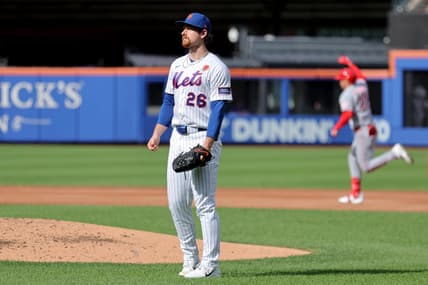 Nolan McLean reacts after allowing a home run for the Mets against the Reds