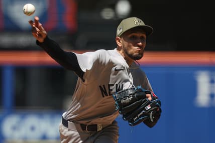 Elmer Rodriguez pitching for the Yankees during a game