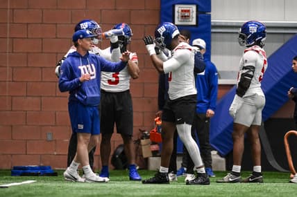 Brian Burns works with Giants outside linebackers coach Charlie Bullen during OTAs