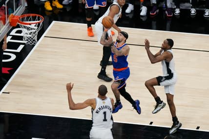 Jose Alvarado defending for the Knicks