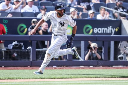 Amed Rosario hitting for the Yankees during a game
