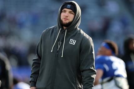Cam Skattebo watches practice before a Giants game against the Vikings