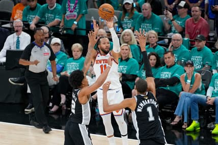 Jalen Brunson shoots over Victor Wembanyama during Knicks-Spurs Finals action