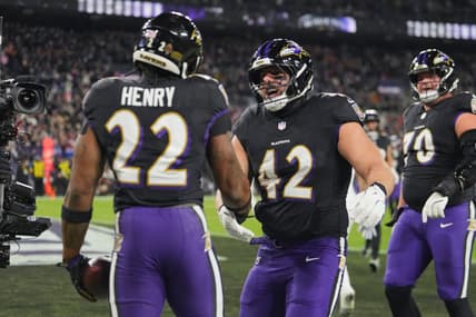 Patrick Ricard congratulates Derrick Henry after a Ravens touchdown