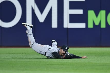 Trent Grisham diving in center field for the Yankees