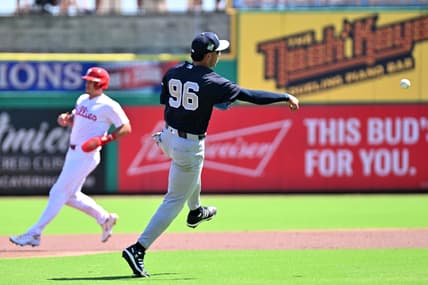 George Lombard Jr. throws to first during Yankees spring training