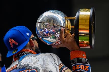 Karl-Anthony Towns celebrating with the Knicks championship trophy