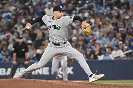 Will Warren pitching for the Yankees during a game