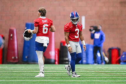 Jun 17, 2025; East Rutherford, NJ, USA; New York Giants quarterback Jaxson Dart (6) and quarterback Russell Wilson (3) interact during minicamp at Quest Diagnostics Training Center. Mandatory Credit: John Jones-Imagn Images