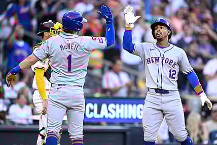 Aug 24, 2024; San Diego, California, USA; New York Mets shortstop Francisco Lindor (12) is congratulated by second baseman Jeff McNeil (1) after hitting a grand slam home run against the San Diego Padres during the fourth inning at Petco Park. Mandatory Credit: Orlando Ramirez-USA TODAY Sports
