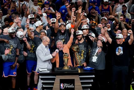 Knicks players celebrate winning the NBA championship