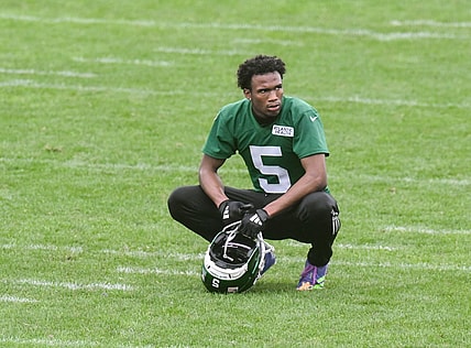 Jun 10, 2025; East Rutherford, NJ, USA; New York Jets wide receiver Garrett Wilson (5) looks on during minicamp at Atlantic Health Jets Training Center. Mandatory Credit: John Jones-Imagn Images