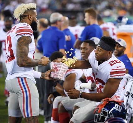 Odell Beckham Jr. greets fans before a Giants preseason game