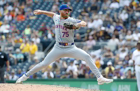 Jul 7, 2024; Pittsburgh, Pennsylvania, USA; New York Mets pitcher Reed Garrett (75) pitches against the Pittsburgh Pirates during the seventh inning at PNC Park. The Mets won 3-2. Mandatory Credit: Charles LeClaire-USA TODAY Sports