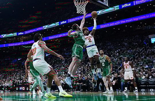 Oct 22, 2024; Boston, Massachusetts, USA; New York Knicks guard Miles McBride (2) shoots against Boston Celtics center Luke Kornet (40) in the second half at TD Garden. Mandatory Credit: David Butler II-Imagn Images