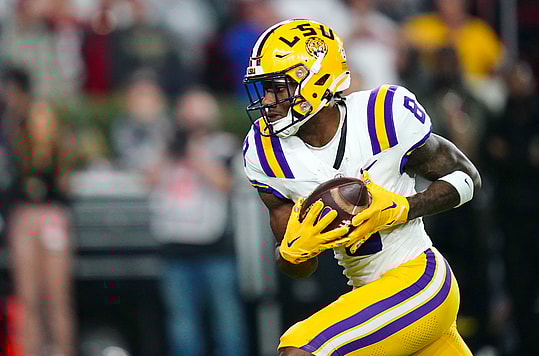 LSU Tigers wide receiver Malik Nabers (8) (New York Giants draft target) hauls in a 46 yard pass for a touchdown against the Alabama Crimson Tide during the first quarter at Bryant-Denny Stadium.