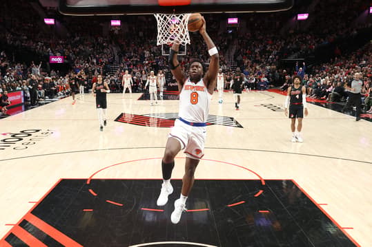 New York Knicks forward OG Anunoby (8) dunks the ball against the Portland Trail Blazers at Moda Center