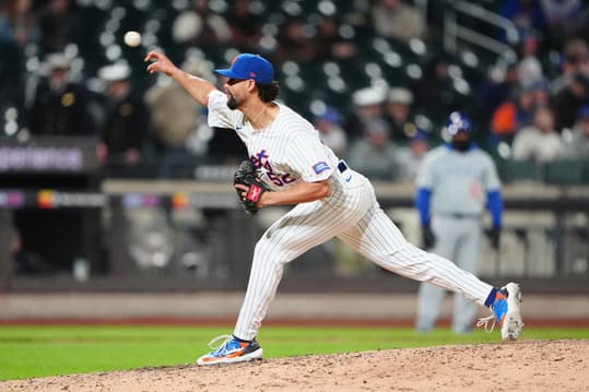 Apr 30, 2024; New York City, New York, USA; New York Mets pitcher Jorge Lopez (52) delivers a pitch against the Chicago Cubs during the ninth inning at Citi Field. Mandatory Credit: Gregory Fisher-USA TODAY Sports