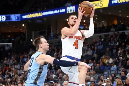 Jan 13, 2024; Memphis, Tennessee, USA; New York Knicks guard Duane Washington Jr. (4) drives to the basket as Memphis Grizzlies guard Luke Kennard (10) defends during the first half at FedExForum. Mandatory Credit: Petre Thomas-USA TODAY Sports