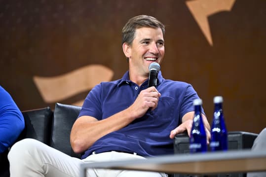 NEW YORK, NEW YORK (GIANTS) - AUGUST 16: Eli Manning speaks onstage at the Fanatics Fest NYC 2024 at Jacob Javits Center on August 16, 2024 in New York City. (Photo by Roy Rochlin/Getty Images for Fanatics)