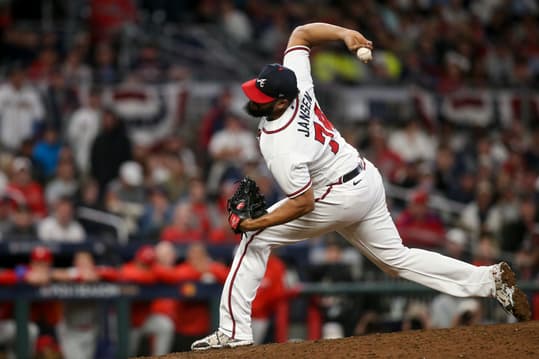 Oct 12, 2022; Atlanta, Georgia, USA; Atlanta Braves relief pitcher Kenley Jansen (74) throws against the Philadelphia Phillies in the ninth inning during game two of the NLDS for the 2022 MLB Playoffs at Truist Park. Mandatory Credit: Brett Davis-Imagn Images