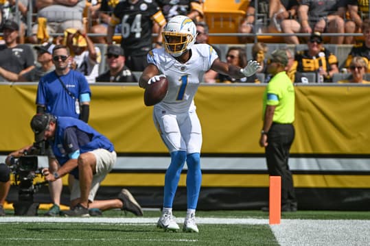 Sep 22, 2024; Pittsburgh, Pennsylvania, USA; Los Angeles Chargers wide receiver Quentin Johnston (1) celebrates a touchdown against the Pittsburgh Steelers during the first quarter at Acrisure Stadium. Mandatory Credit: Barry Reeger-Imagn Images