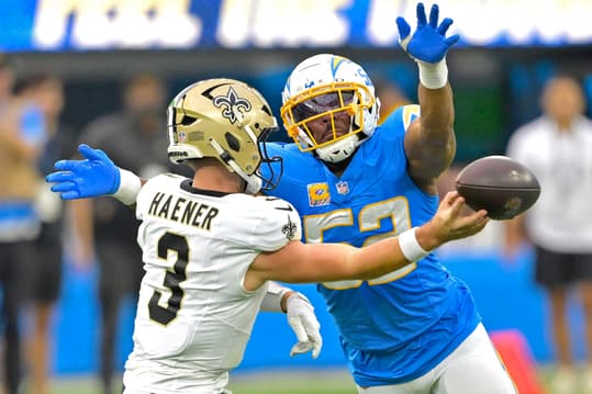 Oct 27, 2024; Inglewood, California, USA;  Los Angeles Chargers linebacker Khalil Mack (52) forces New Orleans Saints quarterback Jake Haener (3) to throw an incomplete pass in the second half at SoFi Stadium. Mandatory Credit: Jayne Kamin-Oncea-Imagn Images
