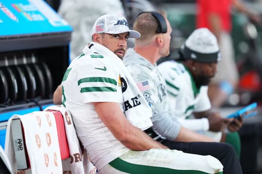 Nov 10, 2024; Glendale, Arizona, USA; New York Jets quarterback Aaron Rodgers (8) looks on against the Arizona Cardinals during the second half at State Farm Stadium. Mandatory Credit: Joe Camporeale-Imagn Images