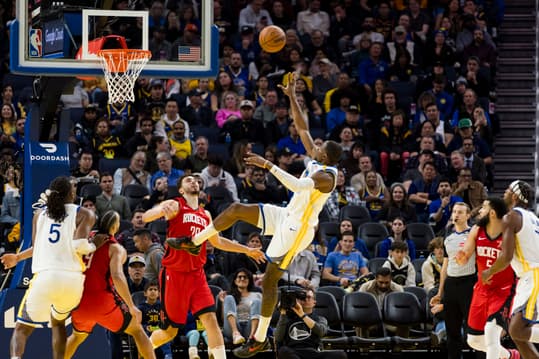 Dec 5, 2024; San Francisco, California, USA;  Golden State Warriors forward Jonathan Kuminga (00) shoots over Houston Rockets center Alperen Sengun (28) during the third quarter at Chase Center. Mandatory Credit: John Hefti-Imagn Images