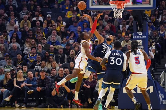 Dec 8, 2024; San Francisco, California, USA; Minnesota Timberwolves center Rudy Gobert (27) blocks the shot of Golden State Warriors forward Jonathan Kuminga (00) in the second period at Chase Center. Mandatory Credit: David Gonzales-Imagn Images