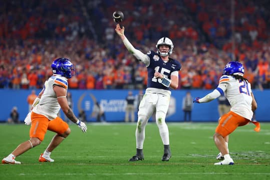 Dec 31, 2024; Glendale, AZ, USA; Penn State Nittany Lions quarterback Drew Allar (15) throws a pass against the Boise State Broncos during the second half in the Fiesta Bowl at State Farm Stadium. Mandatory Credit: Mark J. Rebilas-Imagn Images