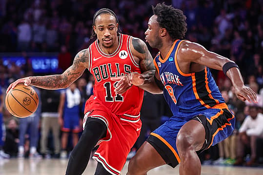 Apr 14, 2024; New York, New York, USA;  Chicago Bulls forward DeMar DeRozan (11) looks to drive past New York Knicks forward OG Anunoby (8) in the fourth quarter at Madison Square Garden. Mandatory Credit: Wendell Cruz-USA TODAY Sports