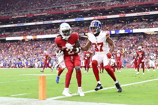 Arizona Cardinals wide receiver Marquise Brown (2) catches a touchdown pass against New York Giants cornerback Tre Hawkins III (37) during the second half at State Farm Stadium
