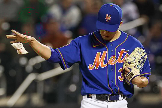 Sep 27, 2023; New York, NY, USA; New York Mets starting pitcher Kodai Senga (34) drops a rosin bag during the fifth inning against the Miami Marlins at Citi Field. Mandatory Credit: Vincent Carchietta-USA TODAY Sports