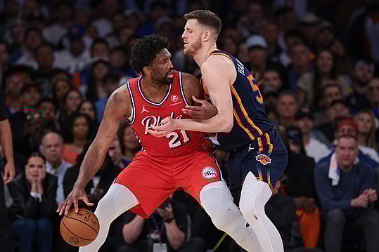 Philadelphia 76ers center Joel Embiid (21) is defended by New York Knicks center Isaiah Hartenstein (55) during the second half during game two of the first round for the 2024 NBA playoffs at Madison Square Garden