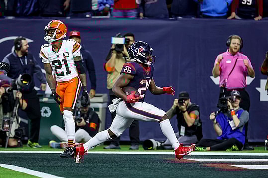 Jan 13, 2024; Houston, Texas, USA; Houston Texans running back Devin Singletary (New York Giants)(26) scores a touchdown during the fourth quarter in a 2024 AFC wild card game at NRG Stadium. Mandatory Credit: Troy Taormina-USA TODAY Sports
